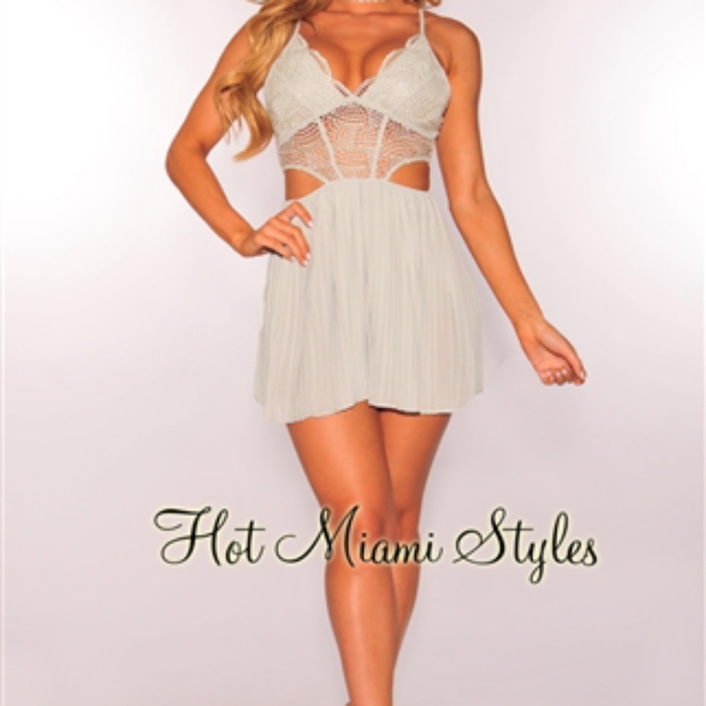 NWT Sage Crochet Pleated Romper